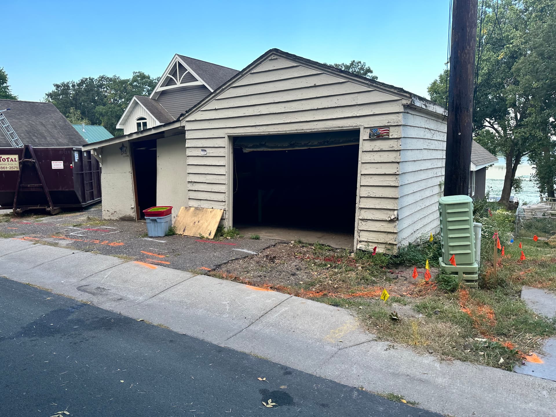 Failing Retaining Wall Rebuilt Right to Support a Minnesota Garage image